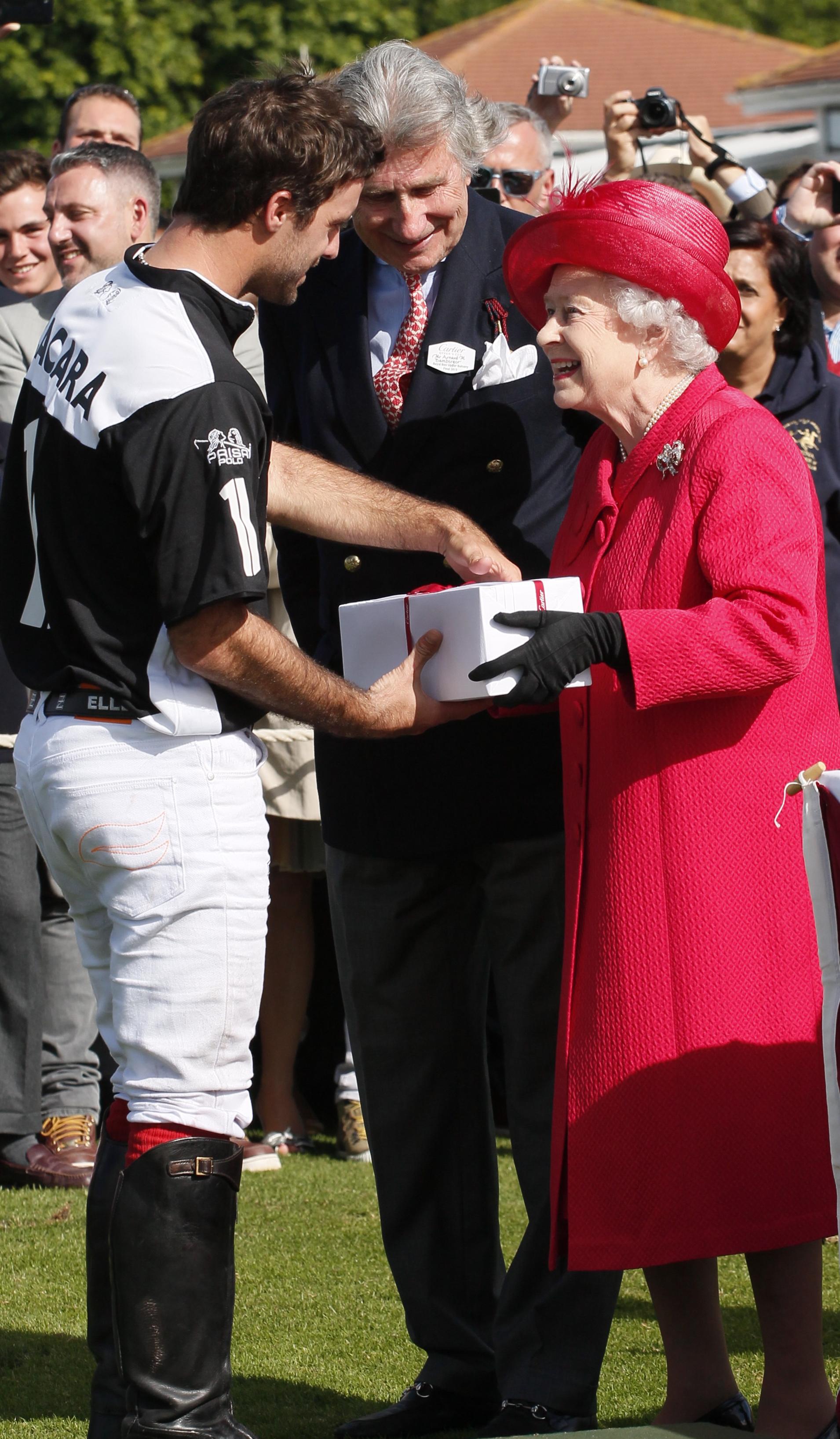 15 Facu smiling to Arnaud M Bamberger Executive Chairman Cartier UK and HM Queen E II